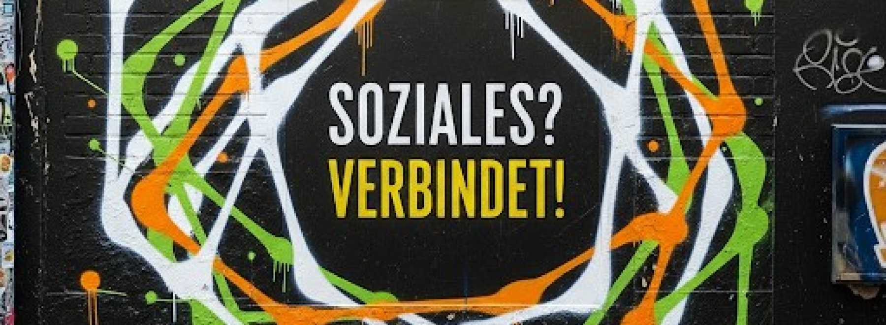 Streetart-Grafik mit dem Schriftzug "Soziales? Verbindet!"